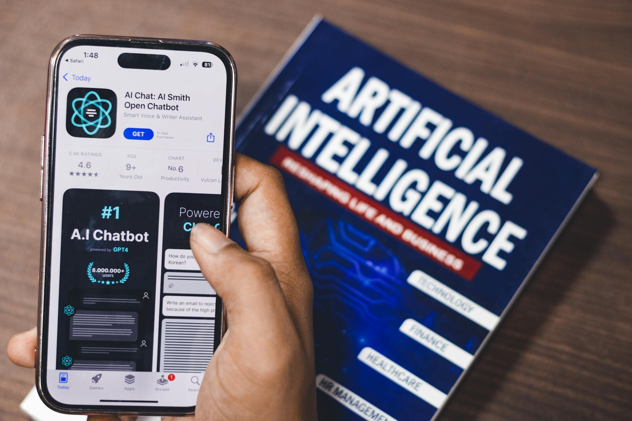 Webpage of Ai Chatbot, a prototype AI Smith Open chatbot, is seen on the website of OpenAI, on a apple smartphone. Examples, capabilities, and limitations are shown.